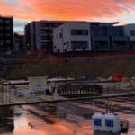 Sunset over construction site concrete floor slab